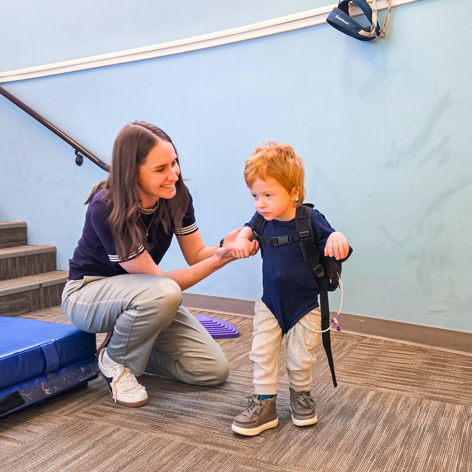 child learning to walk with physical therapist East Idaho