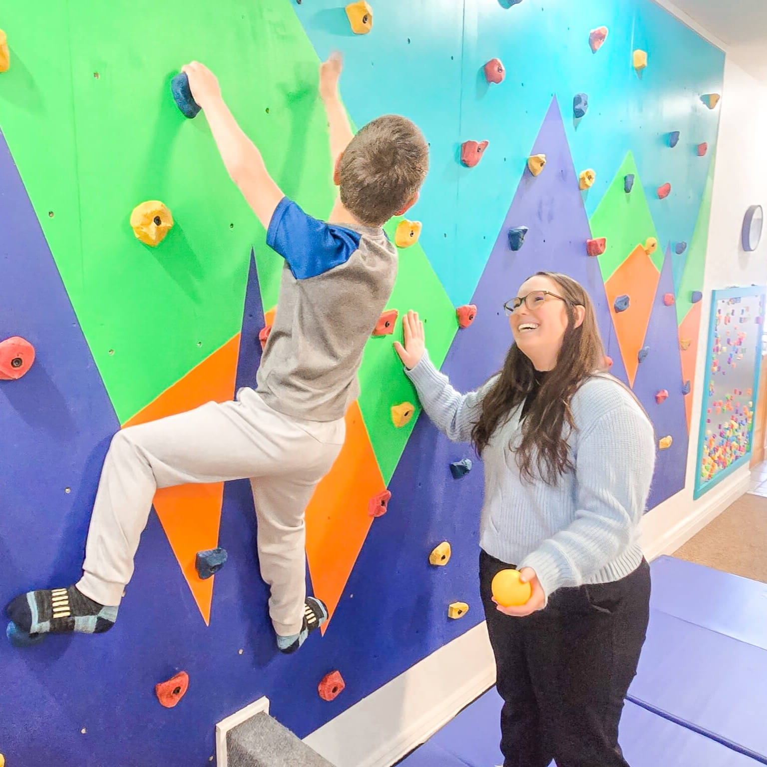 child working on focus and attention skills with occupational therapist East Idaho