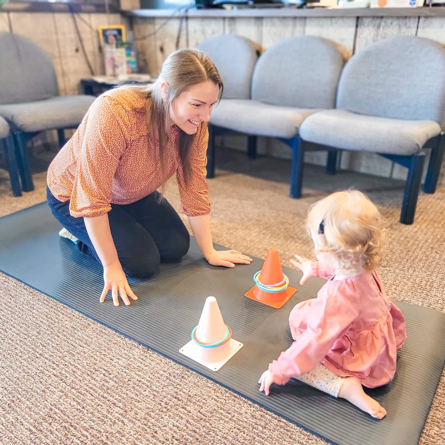 child working on hand eye coordination with occupational therapist East Idaho