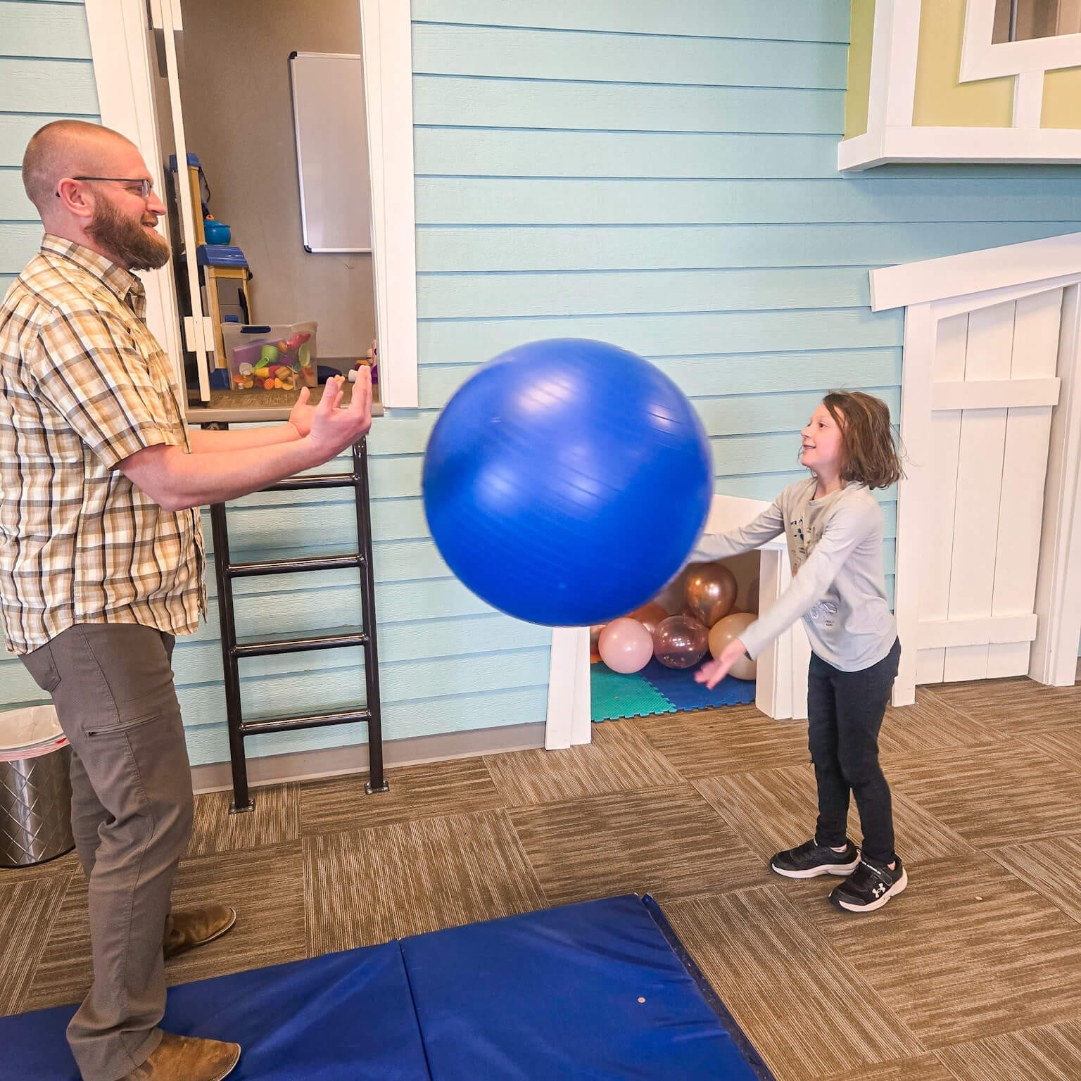 child working with occupational therapist for sensory processing challenges East Idaho